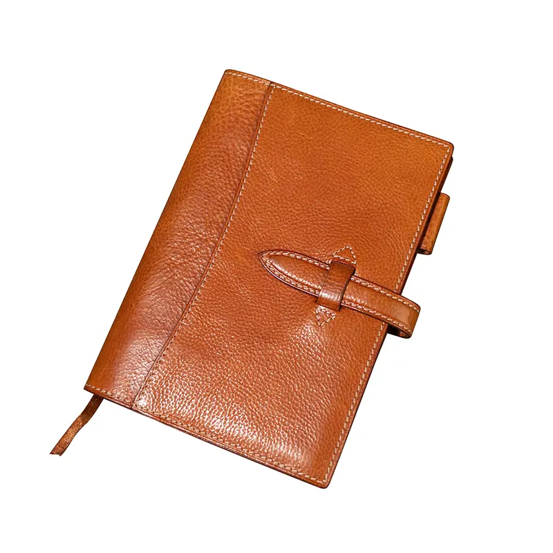 Hva er funksjonene å se etter i en Planner Notebook for travle profesjonelle?